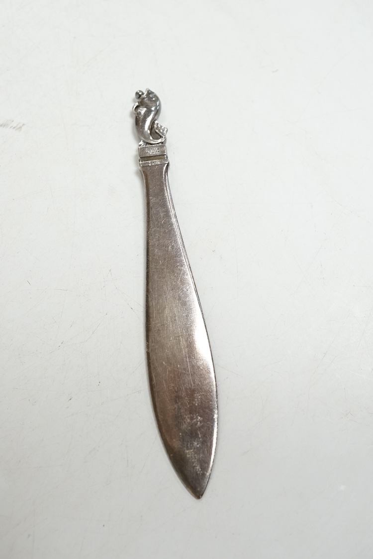 A 1960's Georg Jensen silver paperknife, design no.198, 11.5cm, with dolphin finial.